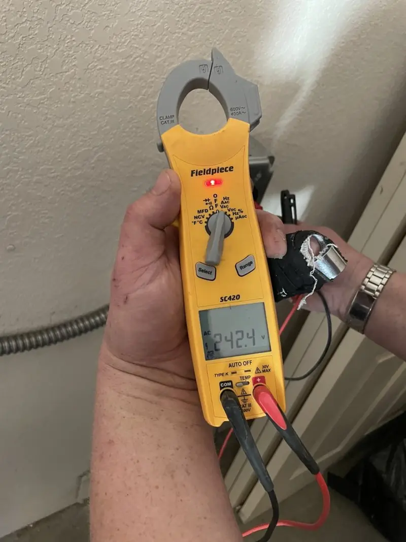 Voltage testing with clamp meter during Hot Tub / Pool Electrical Wiring in Mechanic Falls